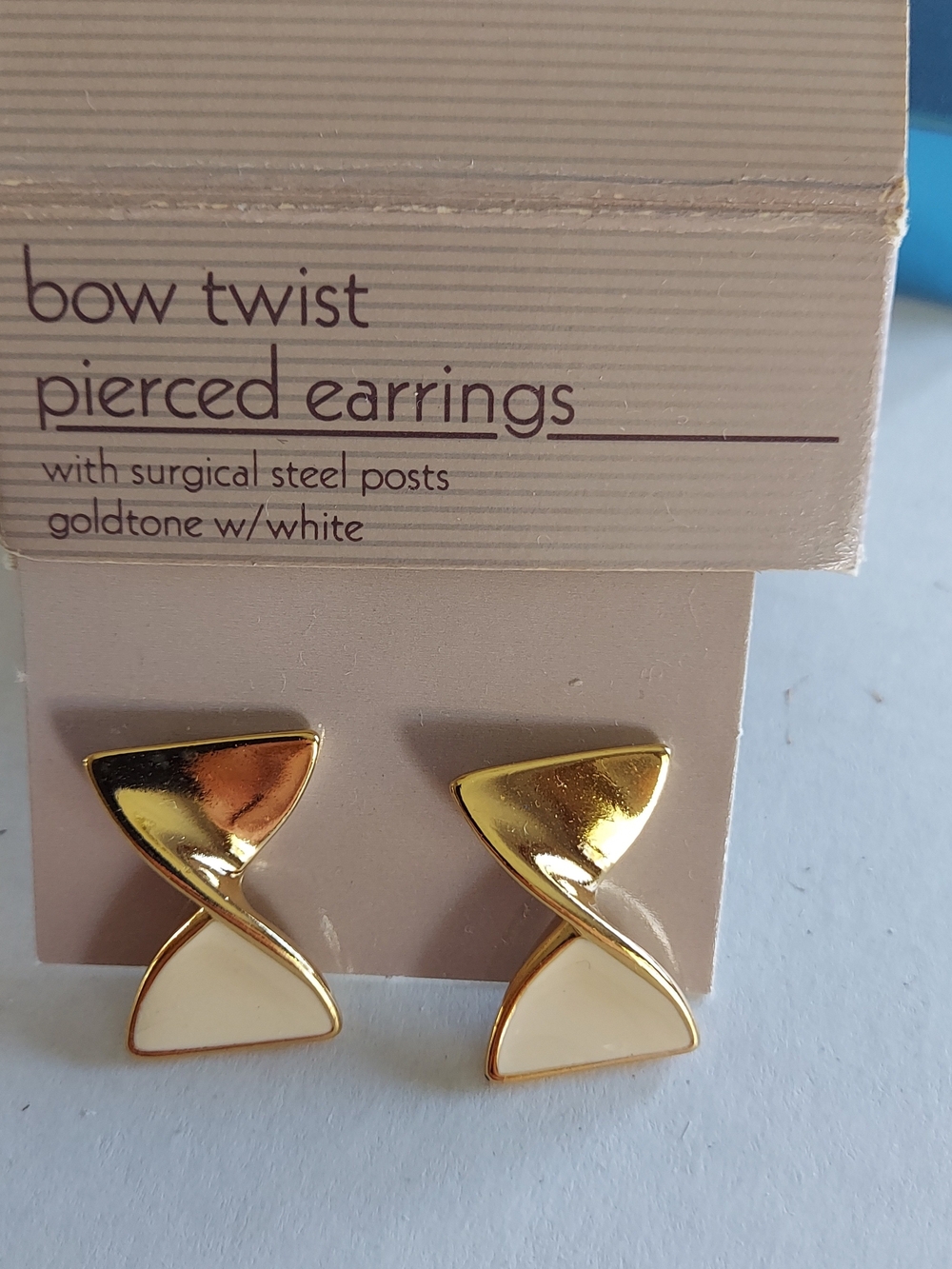 Vintage Avon Goldtone and White Twist Bow Pierced Earrings